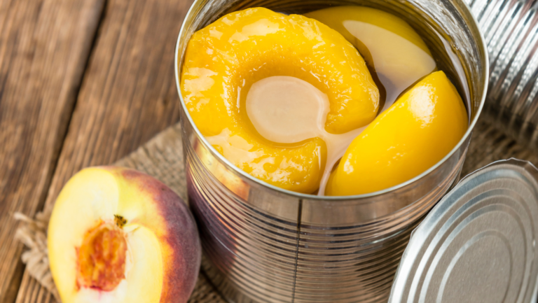 Canned vs frozen peaches comparison for cobbler, showing a tin of canned peaches