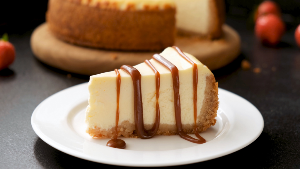 Perfectly thickened cheesecake with a smooth, creamy top layer on a plate.