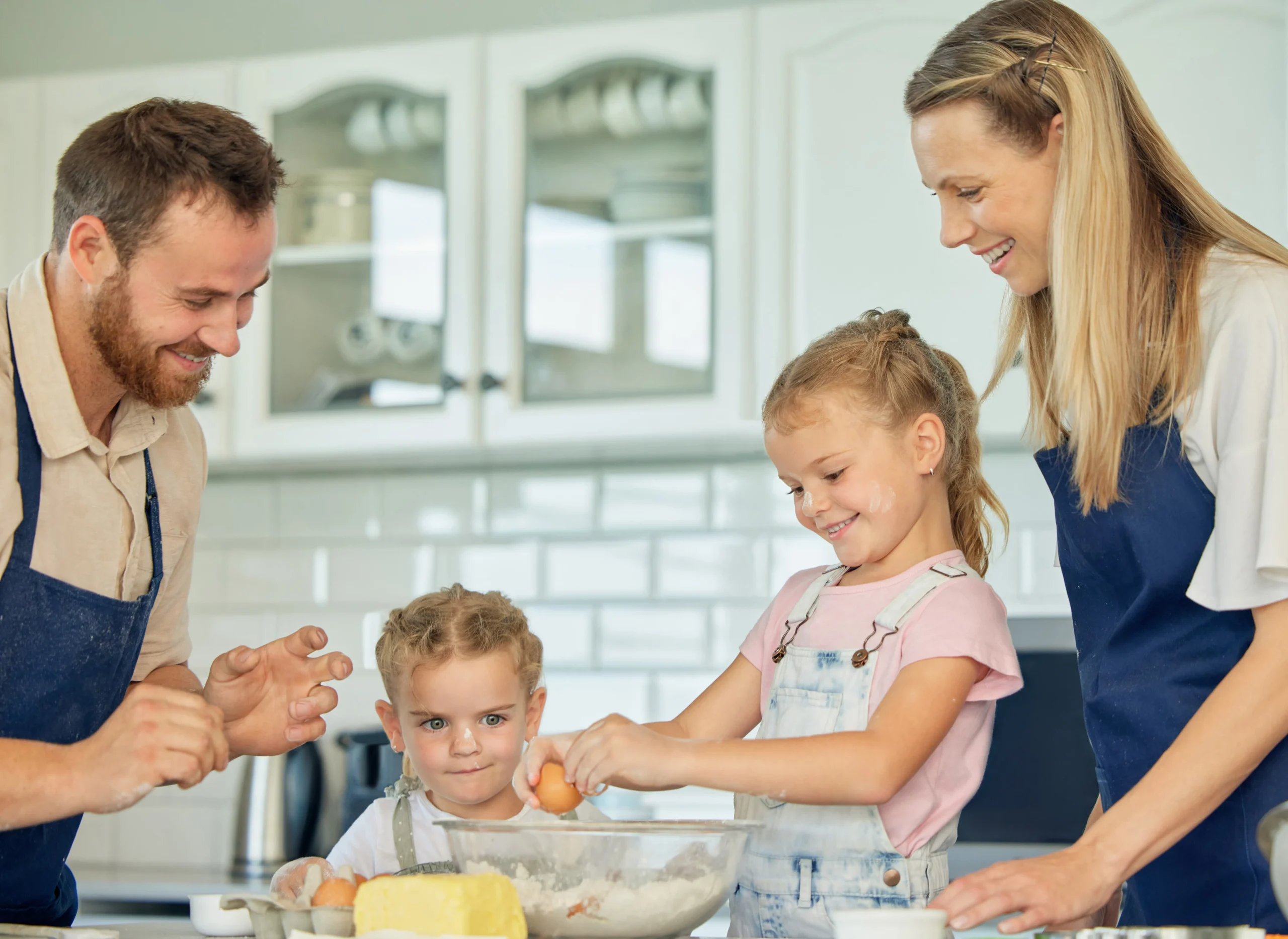 my two daughters and may beloved husband I'm Rachel Bennet and I'm in kitchen with my lovely litlle girl and my beloved husband
